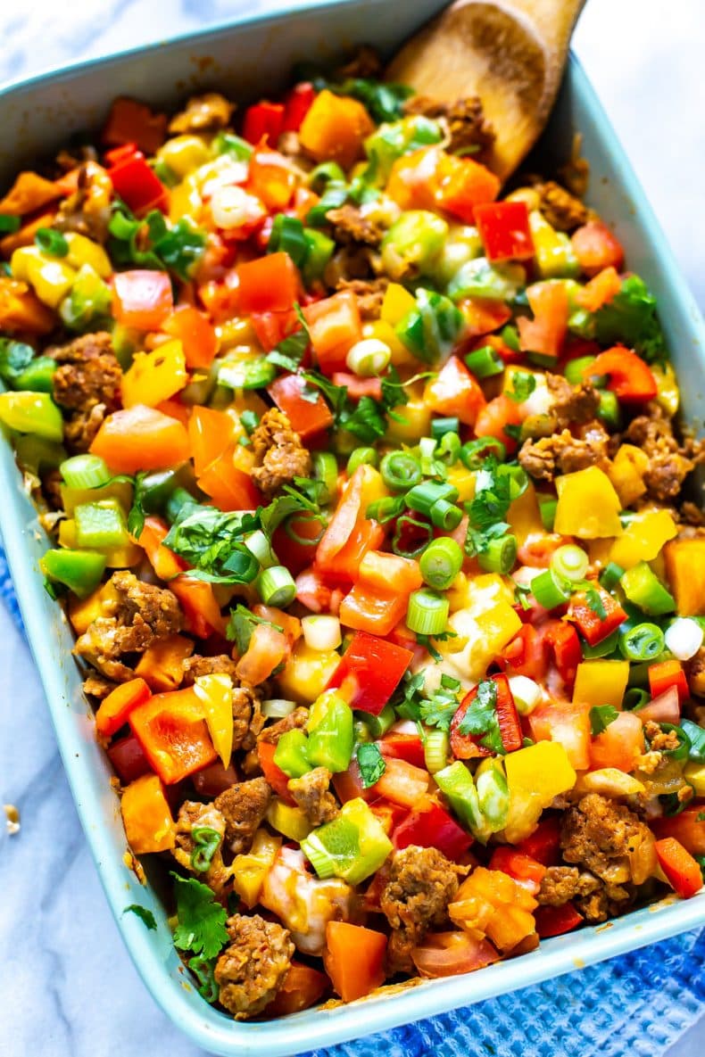 taco bake with ground turkey, diced bell pepper, onions, tomatoes and cheese