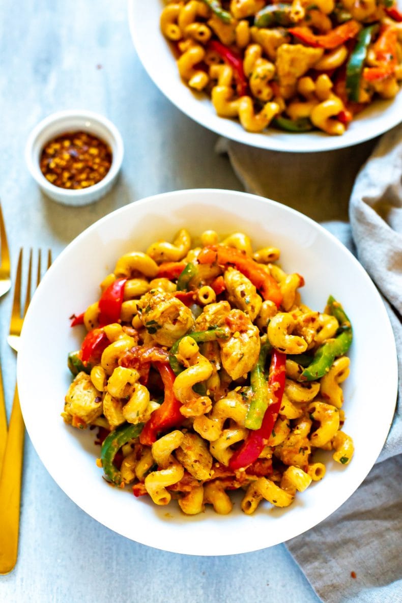 spicy chicken, vegetables, and Cavatappi pasta in a bowl