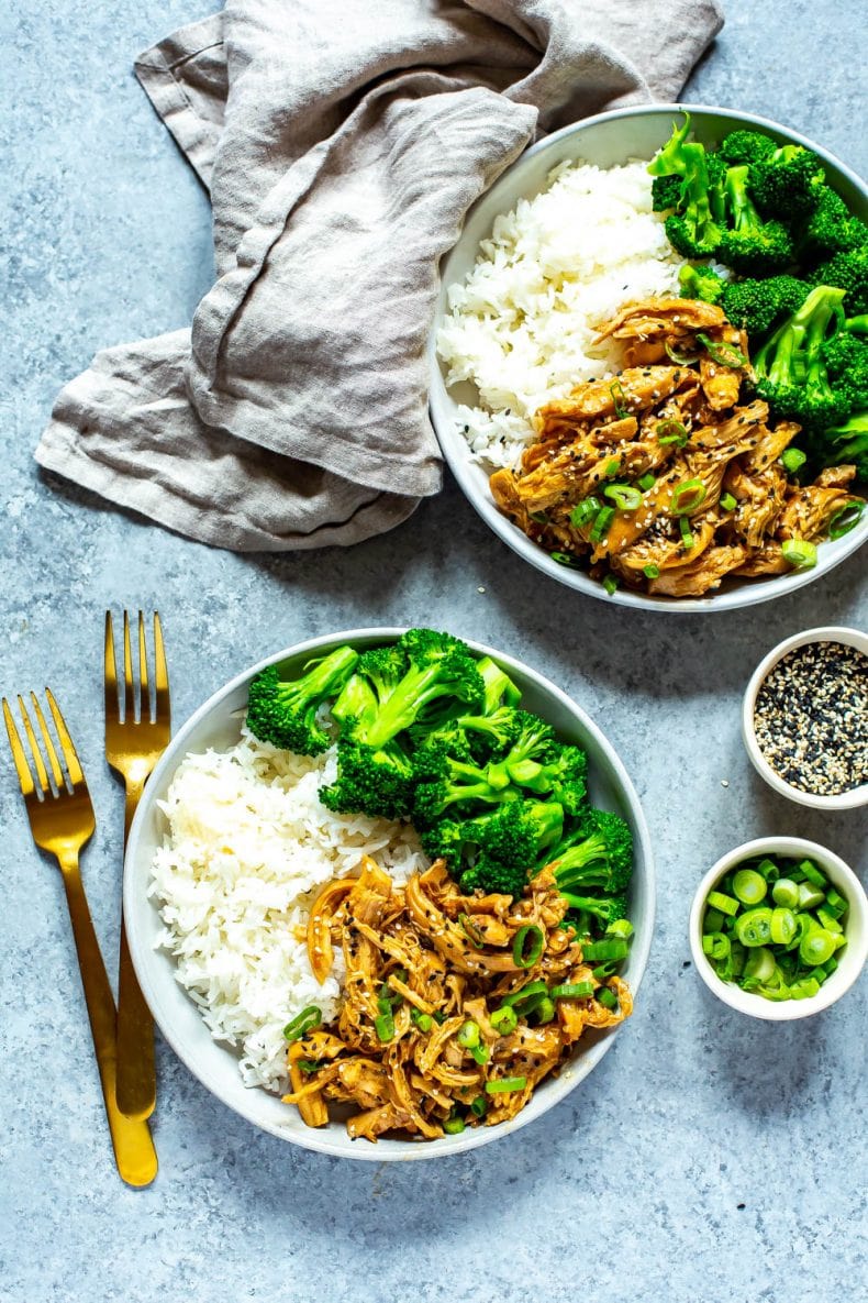 5-Ingredient Crock Pot Chicken Teriyaki on white plates with rice and broccoli