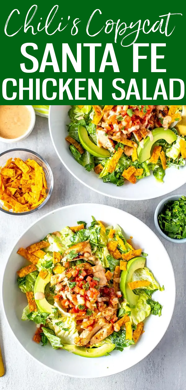 This Santa Fe Chicken Salad is a perfect Chili's copycat recipe loaded with spicy chicken, yummy veggies, tortilla strips and Santa Fe sauce. #chilis #santafesalad