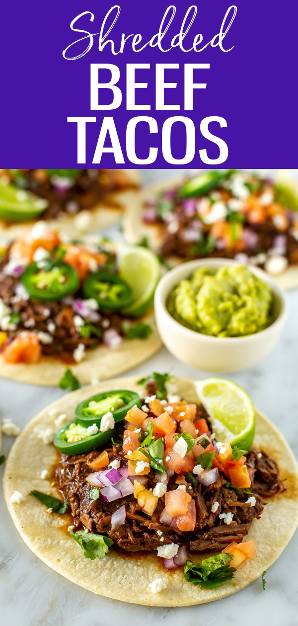 These Shredded Beef Tacos are so tender and delicious! Make them in the slow cooker, Instant Pot or on the stove for an easy weeknight meal. #shreddedbeef #tacos