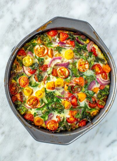 A baked egg white frittata in a pan.
