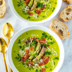 Two bowls of Cream of Asparagus soup.