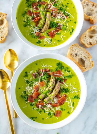 Two bowls of Cream of Asparagus soup.
