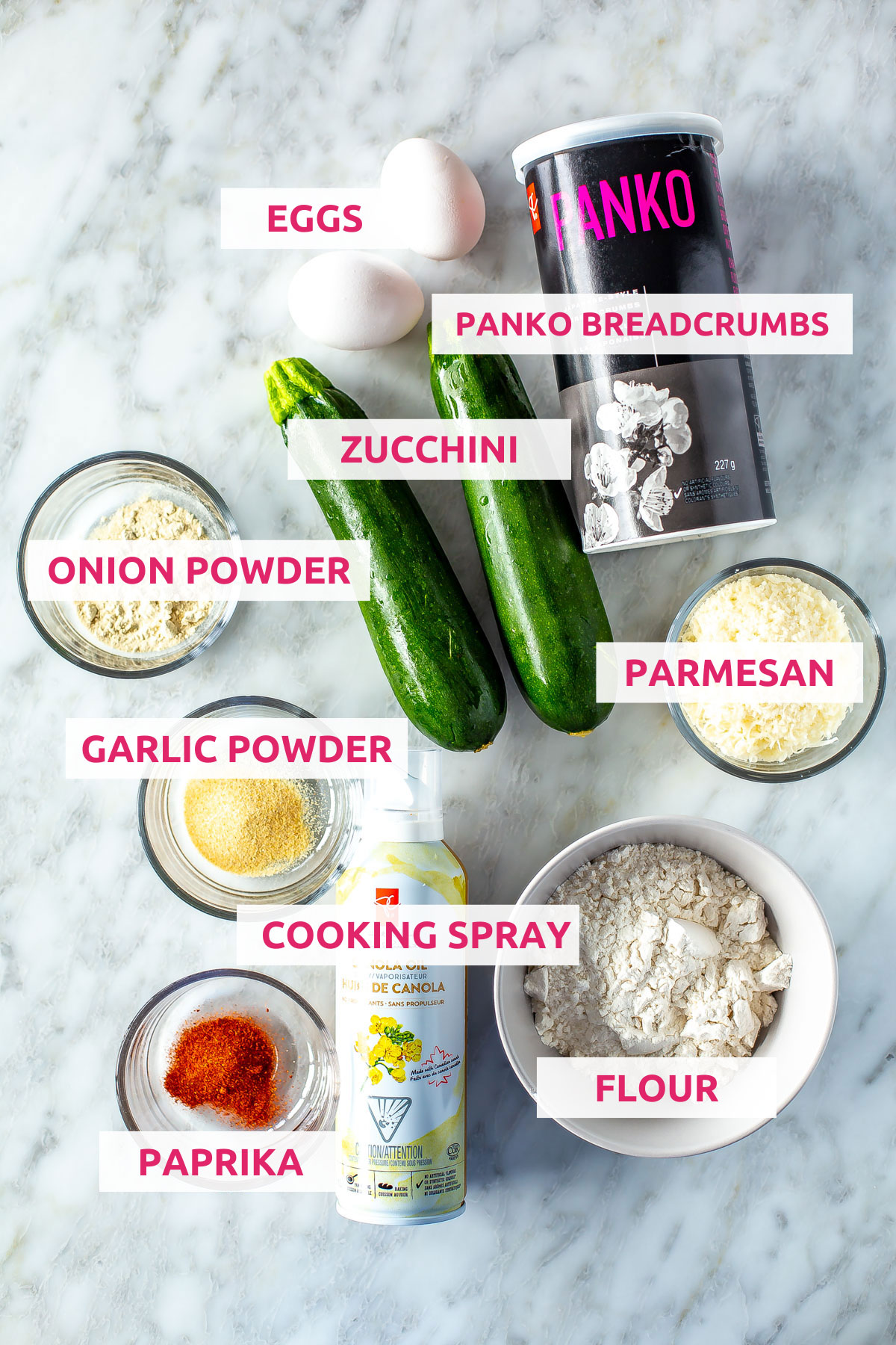 Ingredients for Air Fryer Zucchini Fries: panko breadcrumbs, eggs, zucchini, onion powder, garlic powder, parmesan, cooking spray, flour and paprika.