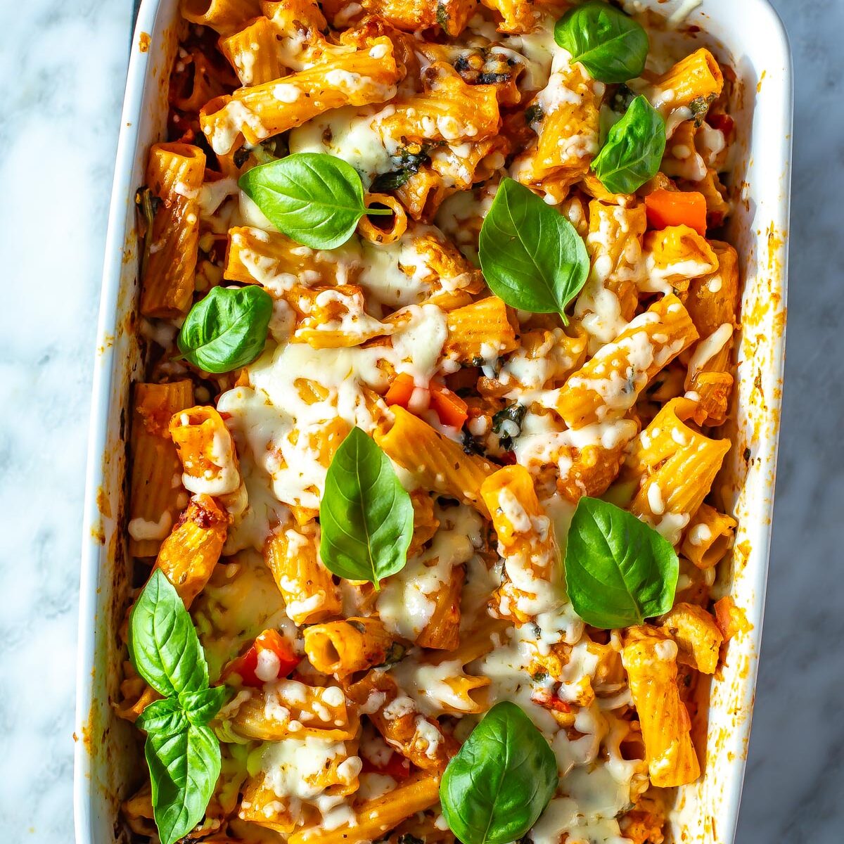 Chicken pasta bake in a a large casserole dish.